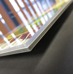 A closeup side view of an acrylic or plexi facemount